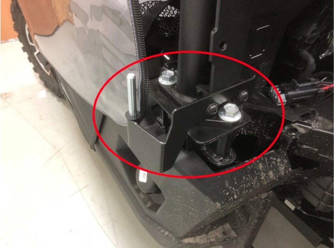 Lower vehicle hinge bolted to the Ranger with washers used as spacers