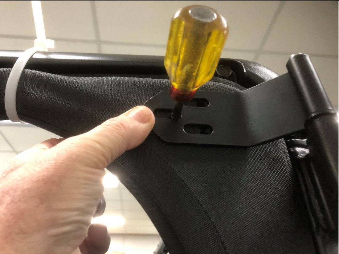 Marking the hinge hole positions on the door with an awl