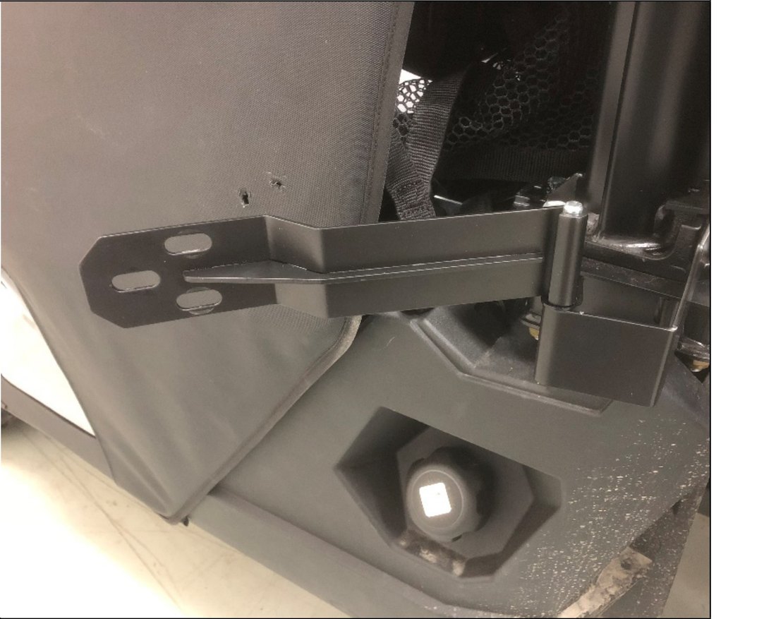 Lower door hinge installed onto the lower hinge pin