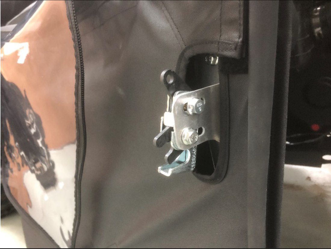 Rotary latch bolted loosely to the door frame